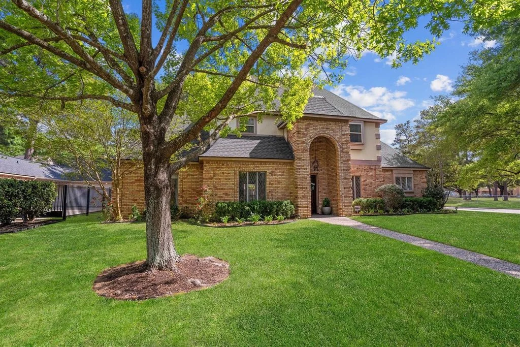 Brick exterior and mature shade trees at 16267 Salmon Lane
